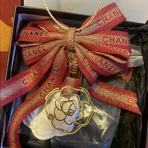 Chanel Red and Gold Floral Accent